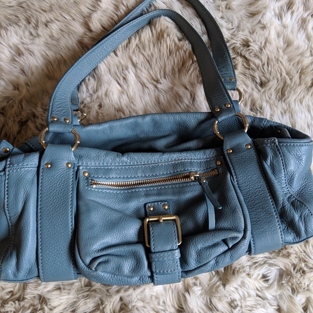 Michael Kors Used blue hand bag.